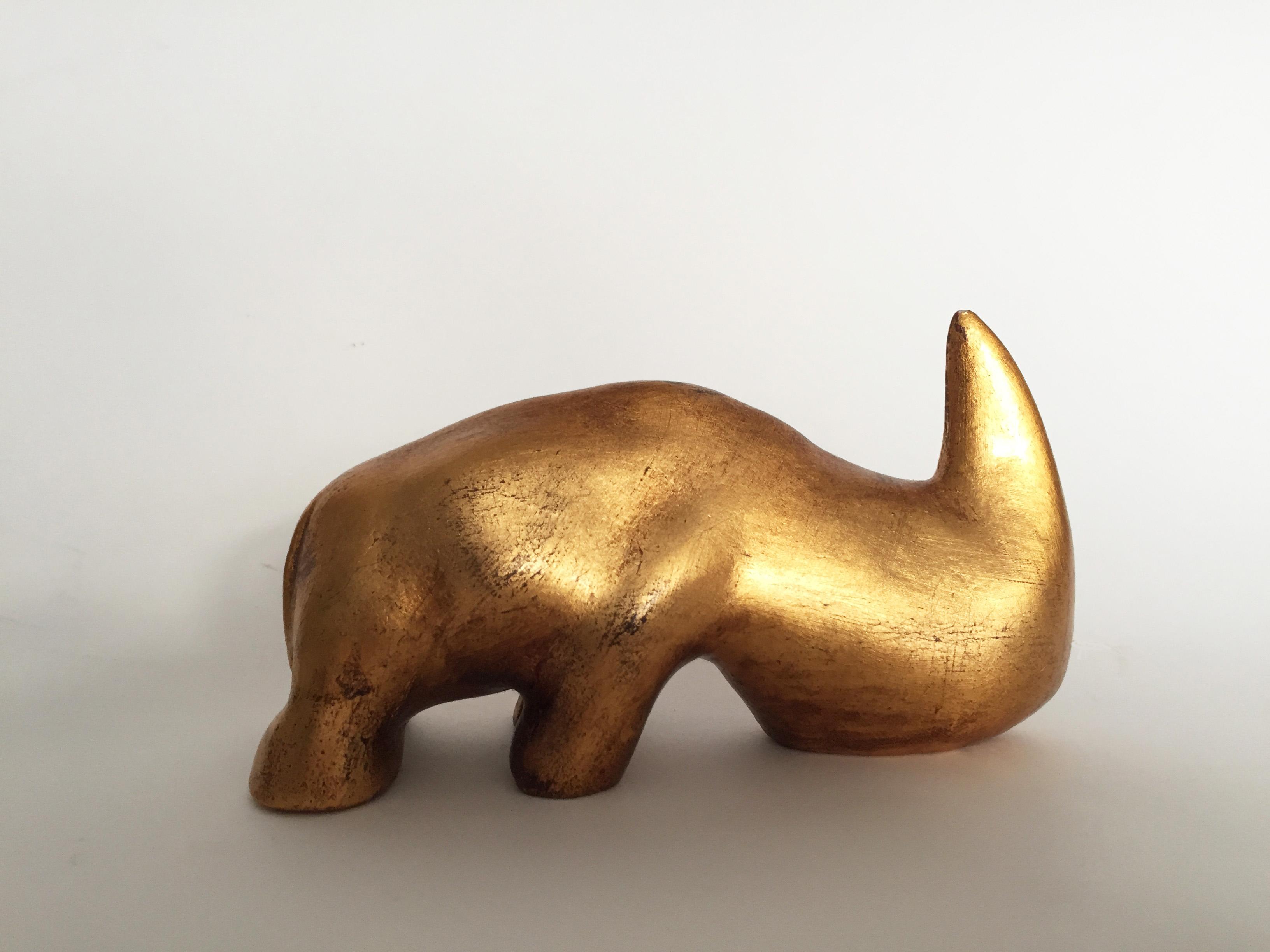 09 Rhinoceros, Gold leaf gilded clay, cm 13.5x6.8x4.8, 1975