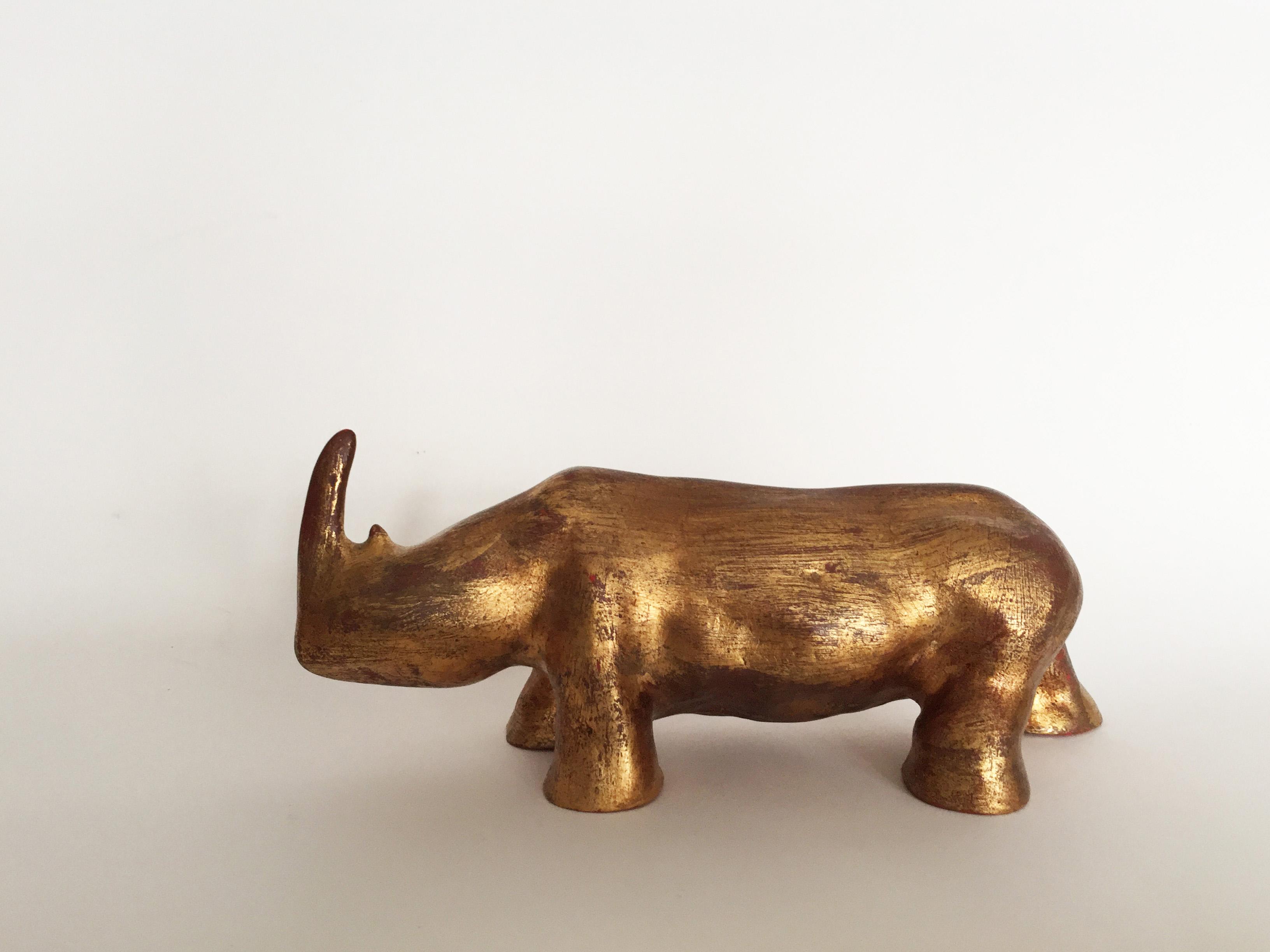 06 Rhinoceros dx, Gold leaf gilded clay, cm 24.5x10.2x10.8, 1975