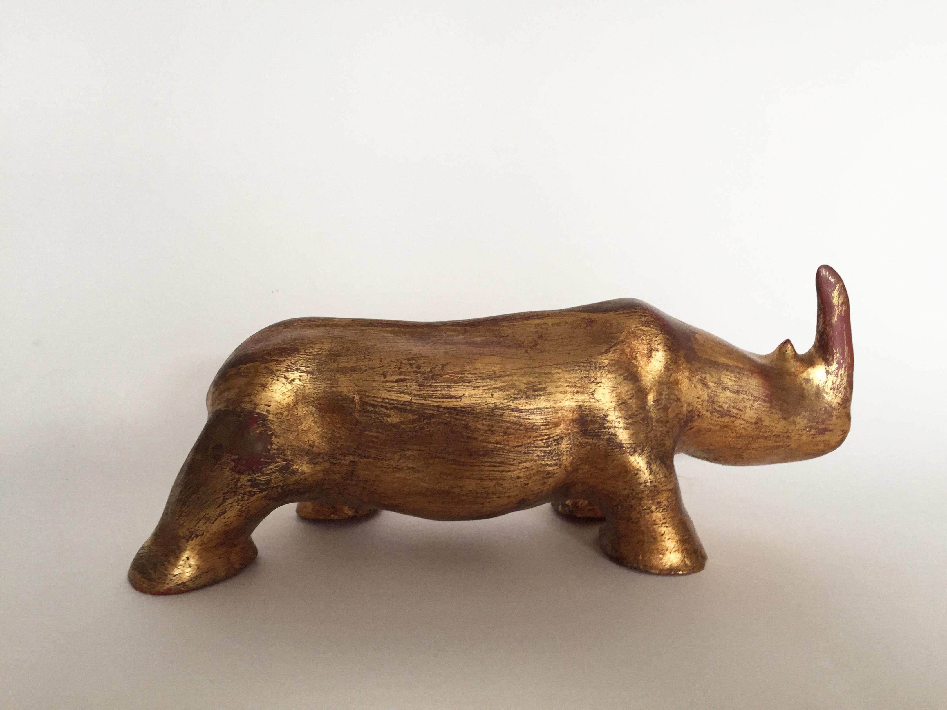 07 Rhinoceros, Gold leaf gilded clay, cm 24.5x10.2x10.8, 1975