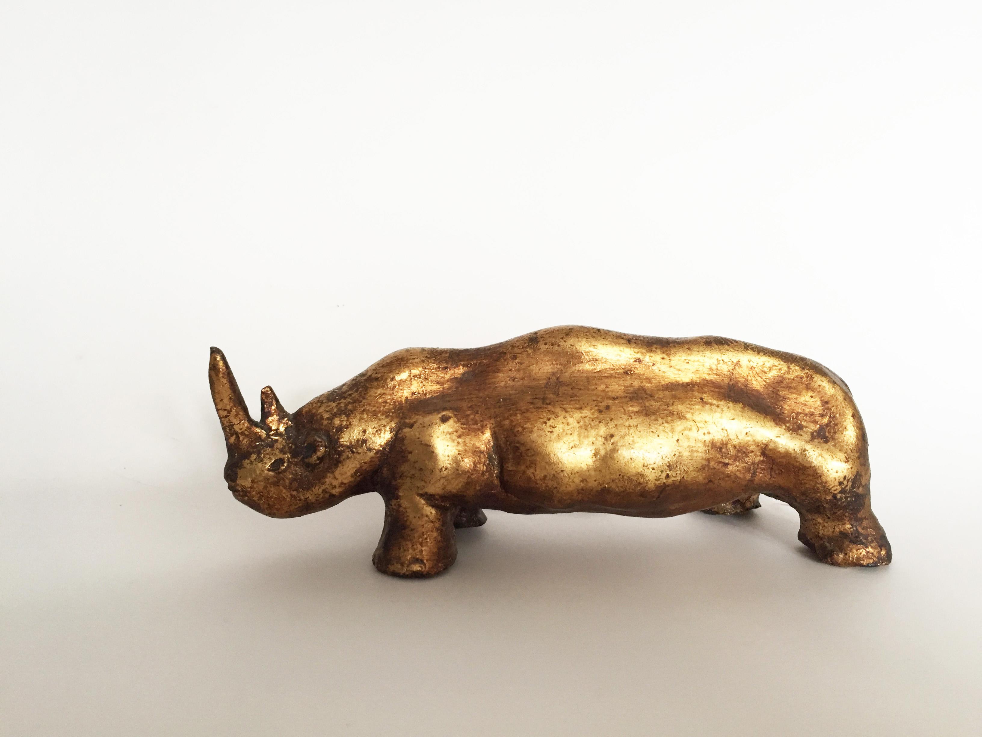 11 Rhinoceros, Gold leaf gilded clay, cm 21.0x8.5x7.5, 1968