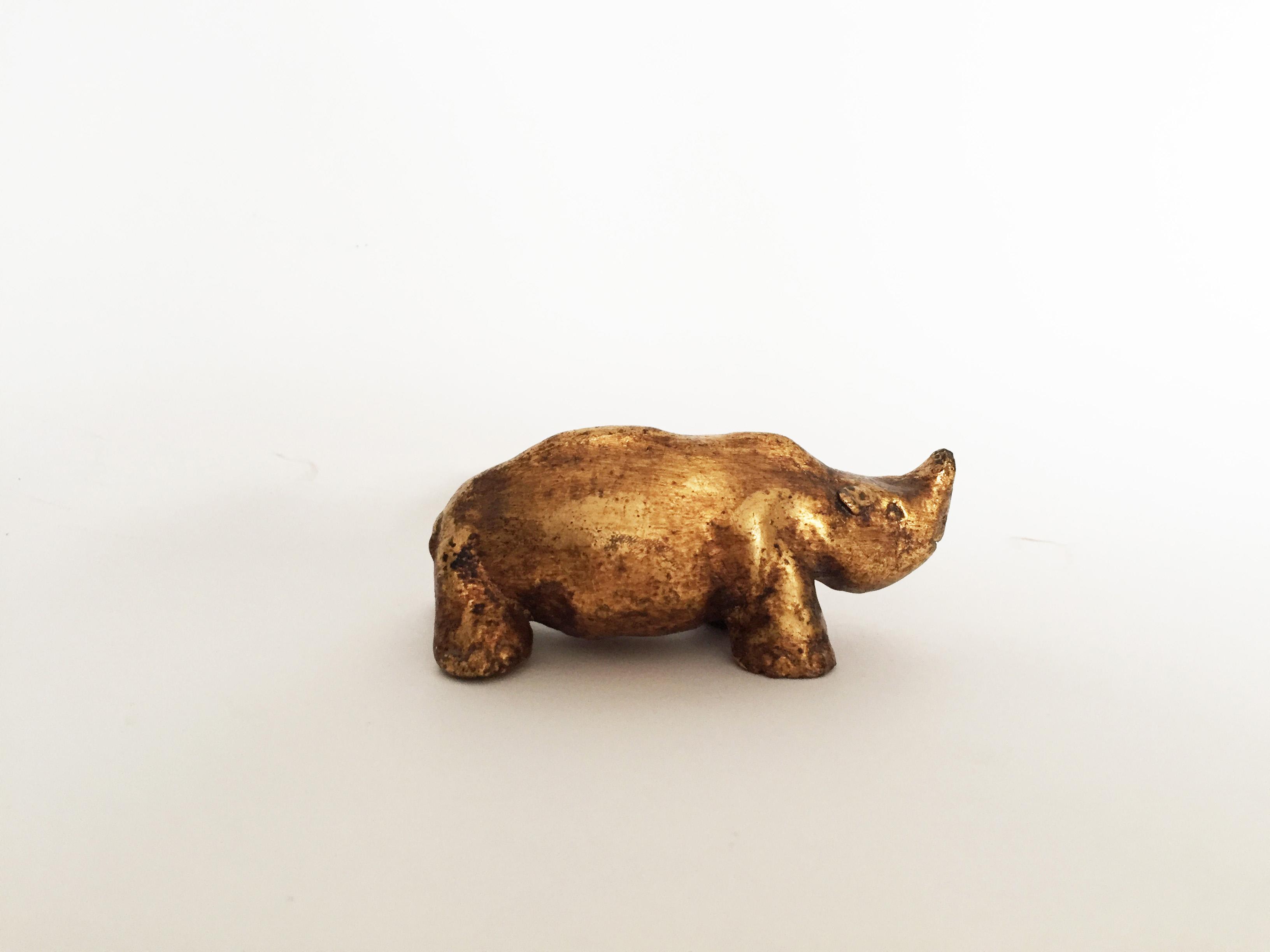 08 Rhinoceros, Gold leaf gilded clay, cm 11.0x4,6x5.0, 1968