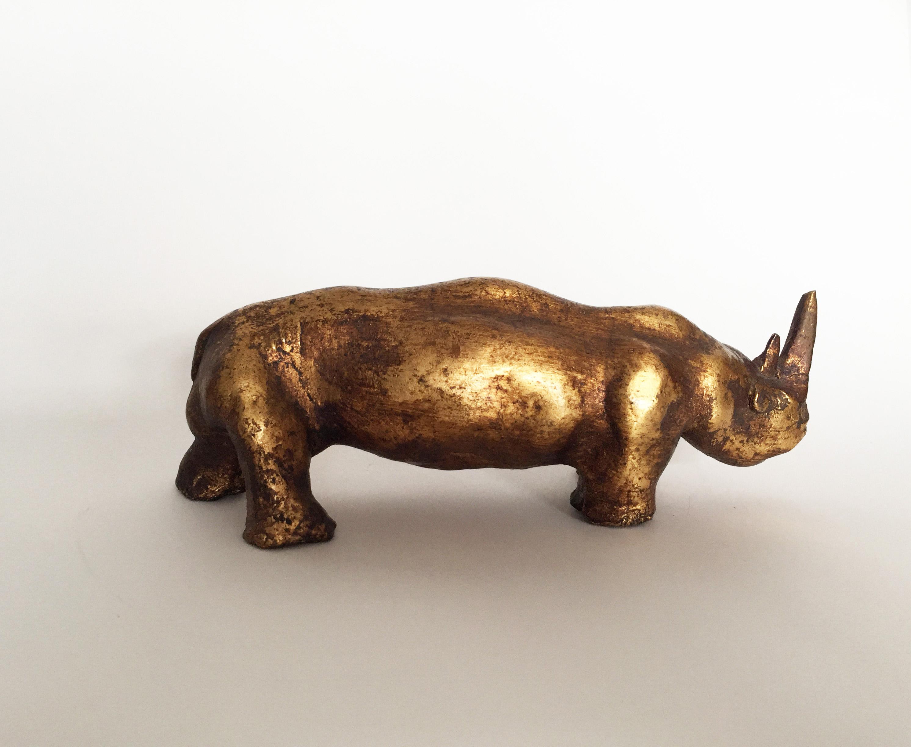 10 Rhinoceros, Gold leaf gilded clay, cm 21.0x8.5x7.5, 1968